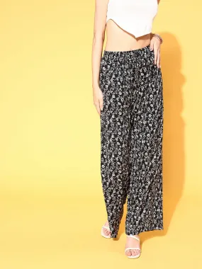 Berrylush Women Black & White Floral Printed High-Rise Waist Wide Leg Flared Trousers